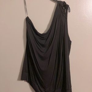Off one shoulder black top sequence on shoulder